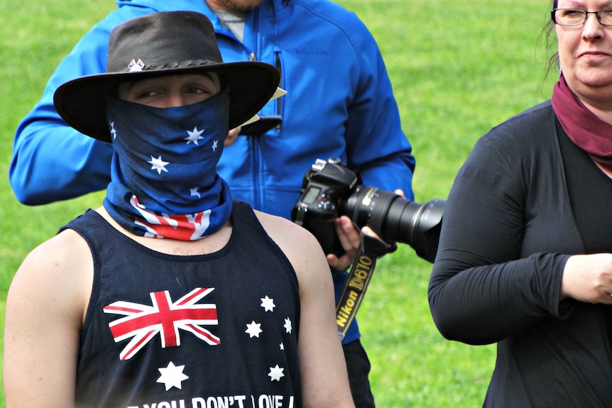 Protester wearing face mask at Melton rally