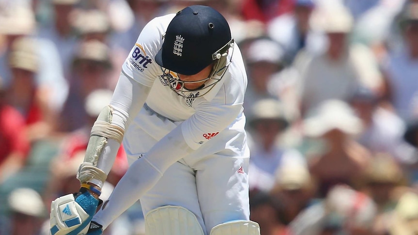 England's Stuart Broad is trapped lbw by Mitchell Johnson on day three of the Third Test.