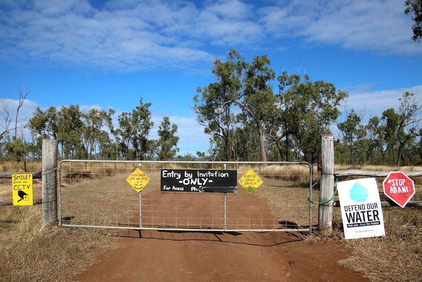 A gate saying 'entry by invitation only'