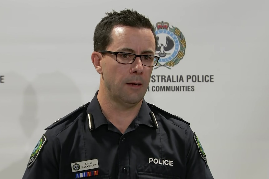 A man wearing a police uniform