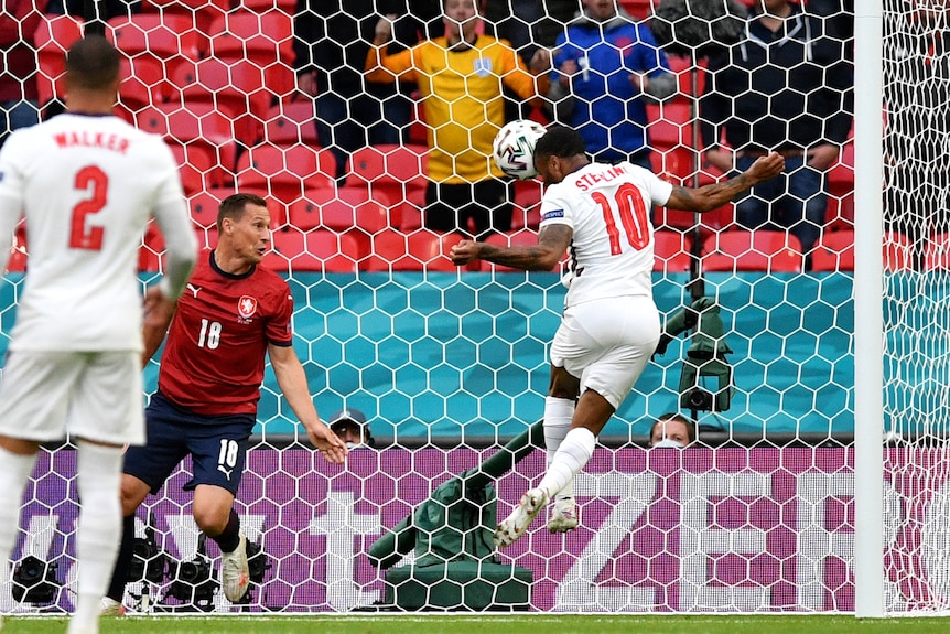 An England forward rises to head the ball into the net against the Czech Republic at Euro 2020.