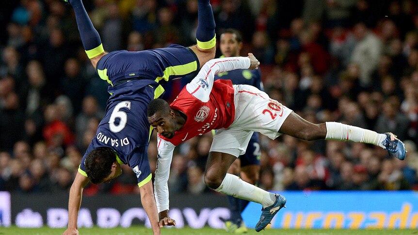 Franco Di Santo and Johan Djourou take a tumble.