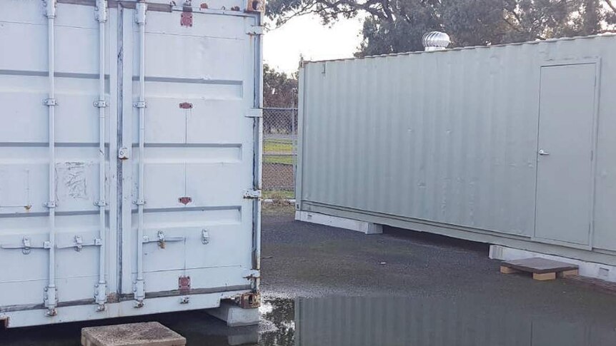 Two shipping containers at a Yarriambiack Shire Council depot used for archiving documents.