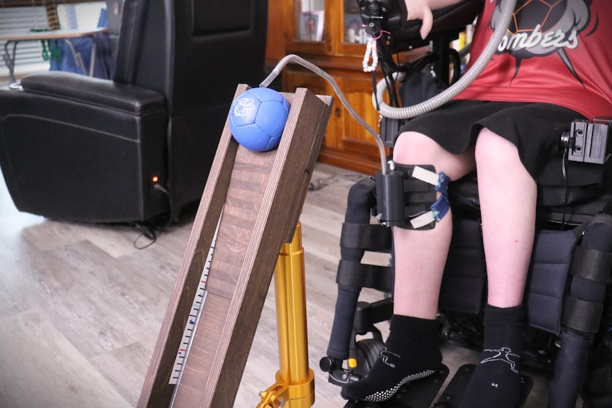 ball on ramp near person in a wheelchair