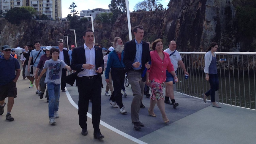 Brisbane Central state MP Robert Cavallucci, Mayor Graham Quirk, and Brisbane Federal MP Teresa Gambaro test out the new walk.