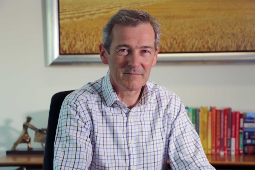 CBH Group CEP Andy Crane sitting at a desk in his office.