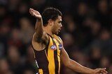 Hawthorn's Cyril Rioli kicks a goal against Essendon at Docklands in July 2013.