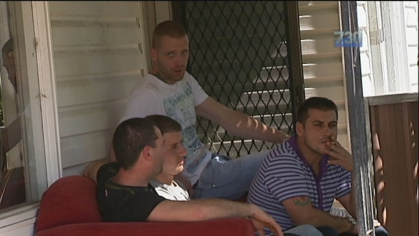 Hungarian 457 workers sit down outside a house in Sydney