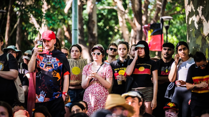 People attend an invasion day rally
