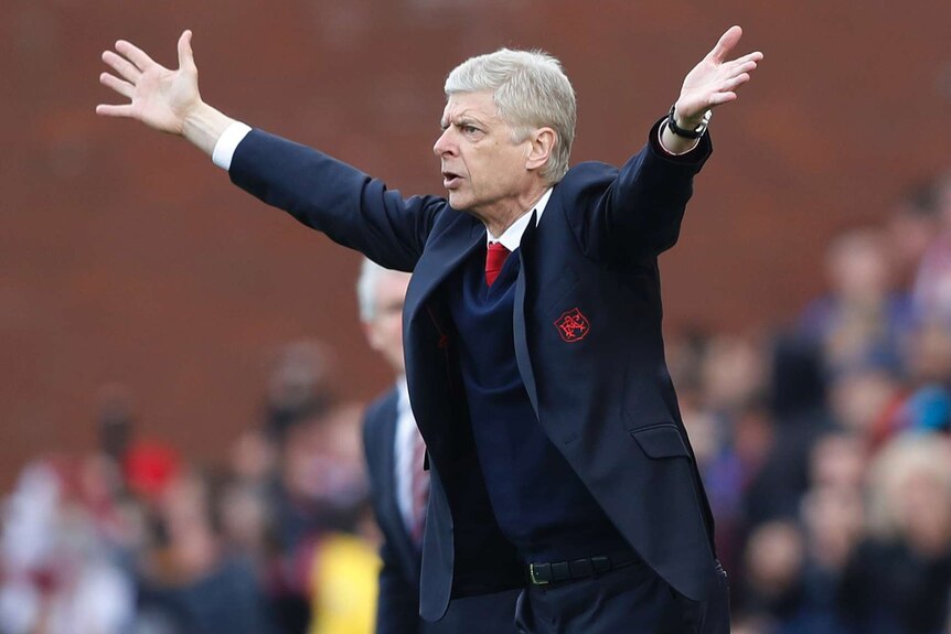 Arsenal manager Arsene Wenger shows his emotion from the sideline against Stoke City.