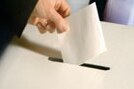 Generic image of a voter lodging their ballot paper.