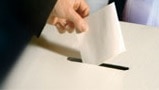Voter lodging ballot paper