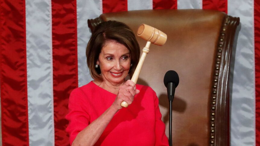Nancy Pelosi wears a fuchsia dress in Congress