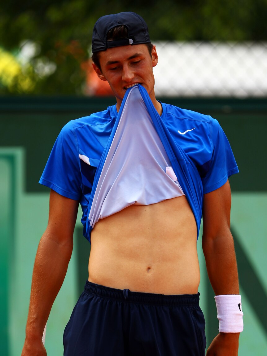 Paris departure ... Bernard Tomic shows his dejection against Santiago Giraldo