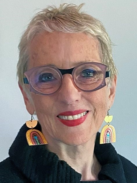 A profile photo of Judy Courtin.