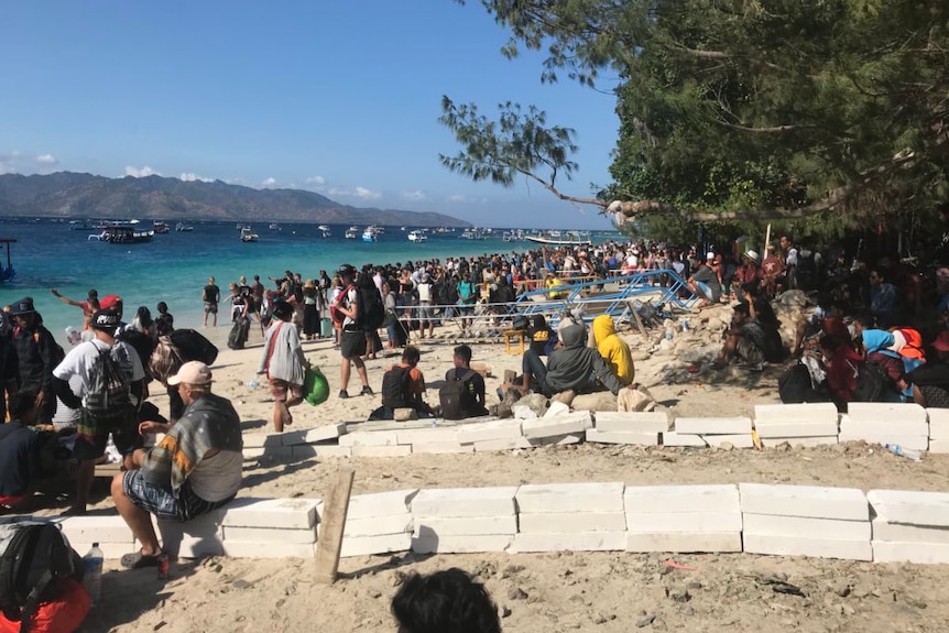 Hundred of people wanted to get off Gili Island after the earthquake caused extensive damage.