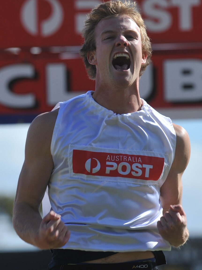Roaring with delight ... outsider Matthew Wiltshire blitzed the field to win the Stawell Gift