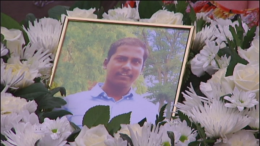 A framed photograph of Sri Lankan asylum seeker Leo Seemanpillai