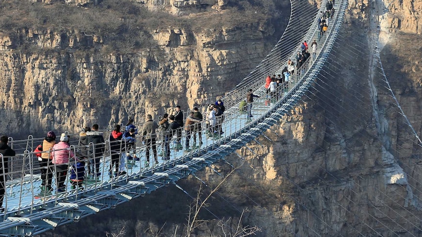 China closes 'scary' glass bridges due to 'safety problems' - ABC News