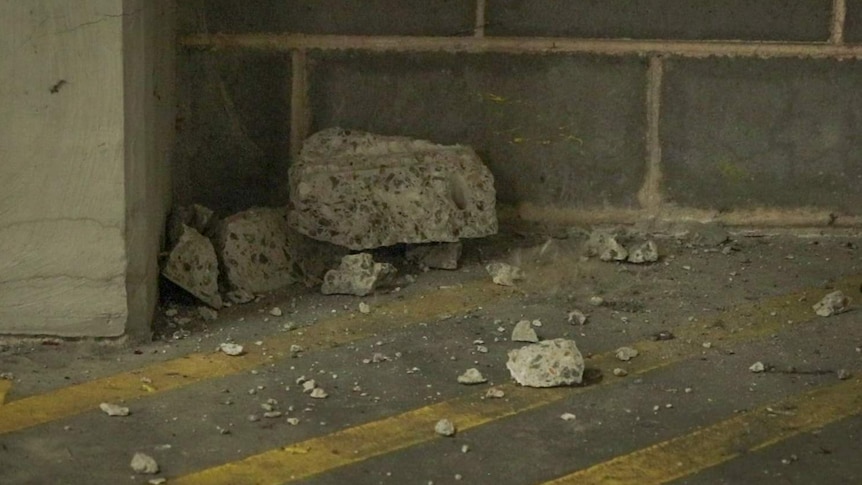 Concrete lumps on car park floor