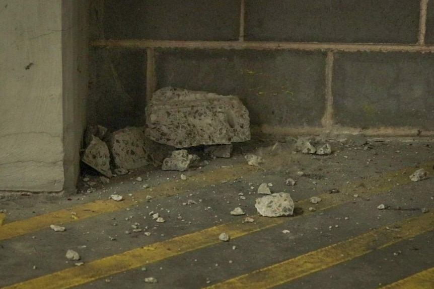Concrete lumps on car park floor