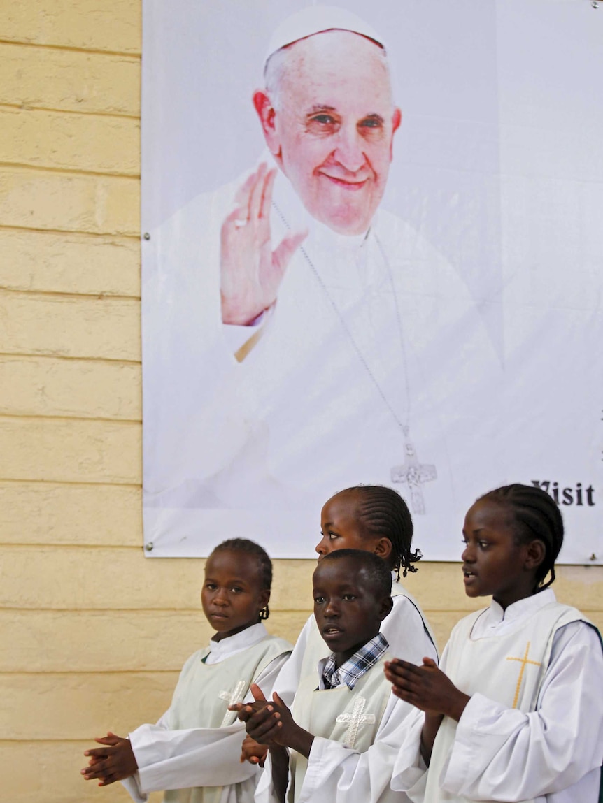 Altar assistants attend a special mass in Kenya