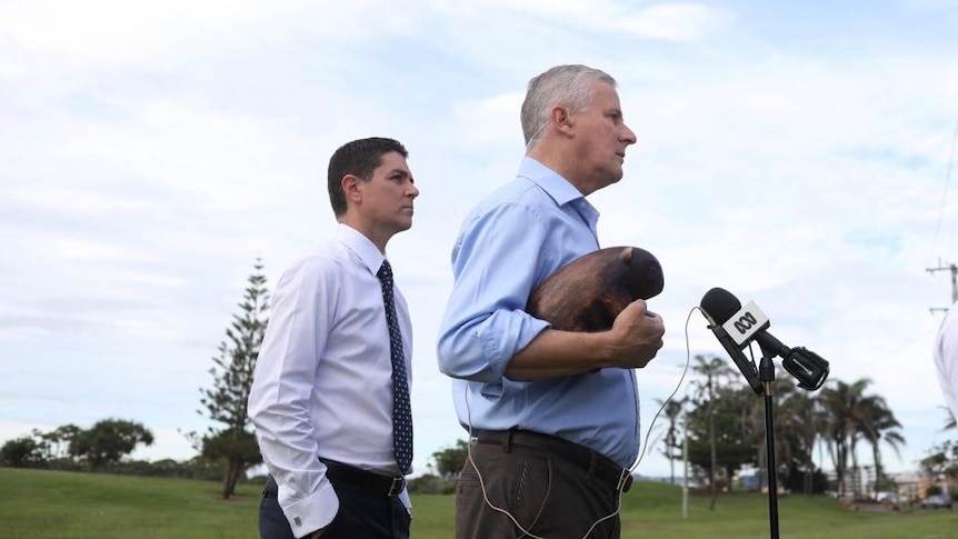 Nationals Leader Michael McCormack holds the wooden wombat.