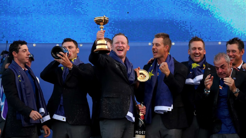 Jamie Donaldson celebrates with Ryder Cup team-mates