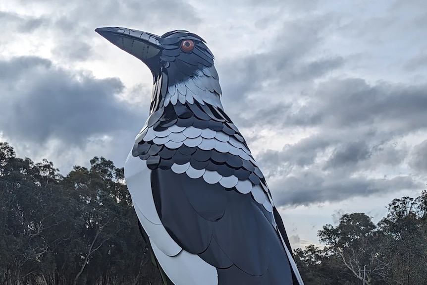 a giant magpie statue. 