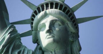 A close-up of the face of the Statue of Liberty.