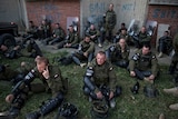 KFOR soldiers take a break in Kosovo