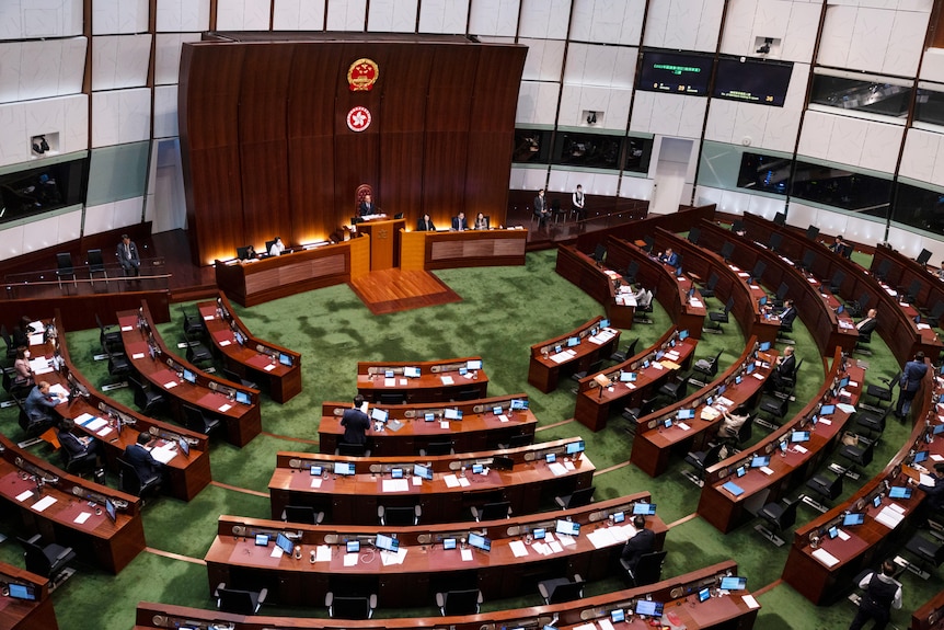 Pro-China lawmakers attend the second reading of a bill that will overhaul district council elections in Hong Kong.