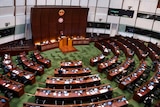 Pro-China lawmakers attend the second reading of a bill that will overhaul district council elections in Hong Kong.