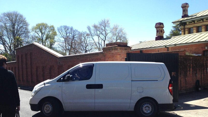 Corrective services van leaving Bathurst courthouse carrying a man refused bail charged with the manslaughter of an Oberon boy, Monday 22 September 2014