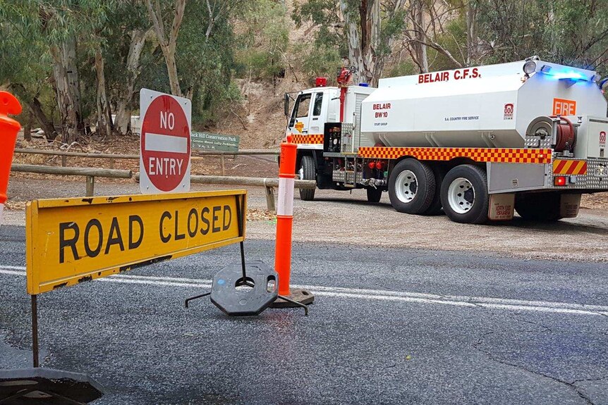 A road closure and a CFS water tanker.