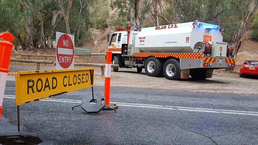 A road closure and a CFS water tanker.