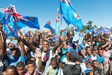Fans greet Fiji's Olympic gold-medal-winning men's sevens rugby team.
