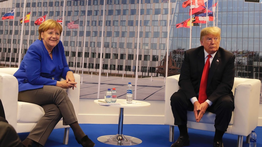 German Chancellor Angela Merkel and U.S. President Donald Trump pose for a photograph