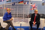 German Chancellor Angela Merkel and U.S. President Donald Trump pose for a photograph