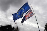 A European Union flag flies near Parliament in London.