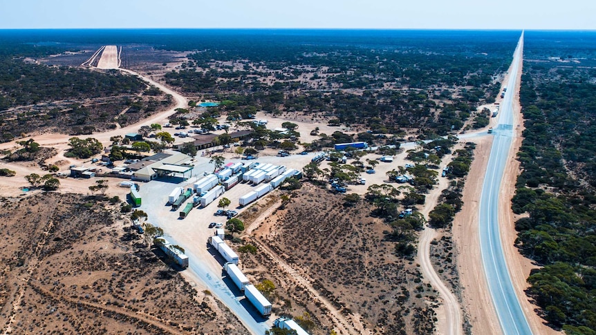 A drone photograph of a remote roadhouse on the Nullarbor