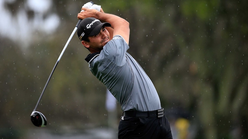 Australia's Jason Day hits a tee shot on 12th hole on day three of the Arnold Palmer Invitational.