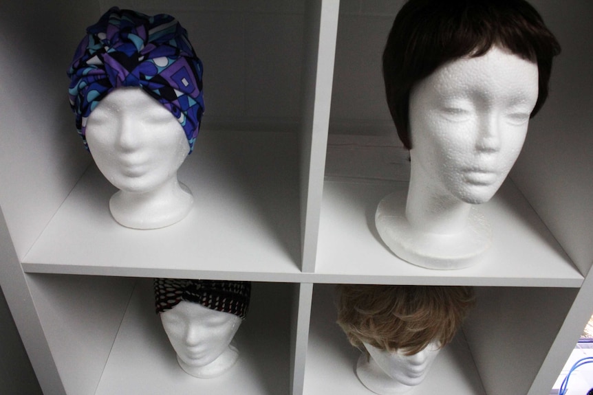 Wide-range of wigs on display on a shelf