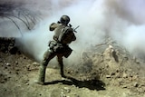 SAS Soldier during a raid on a mud bunker in Afghanistan in 2012.