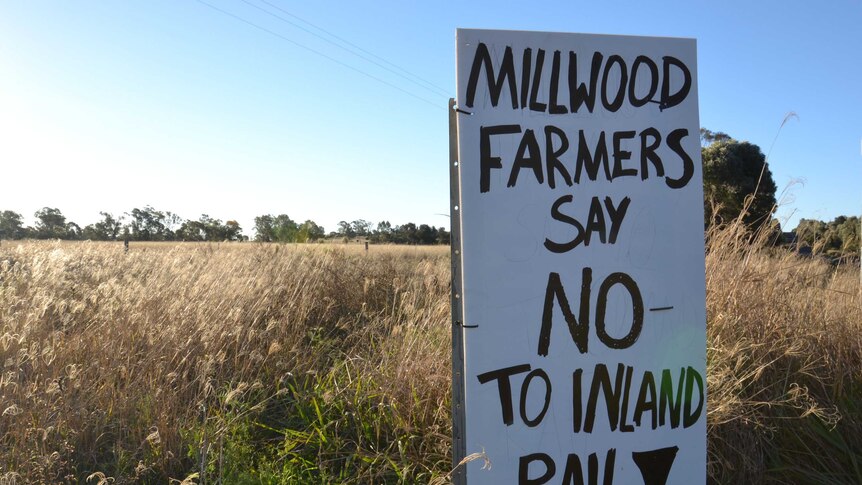 A sign read: 'Millwood farmers say no to inland rail'