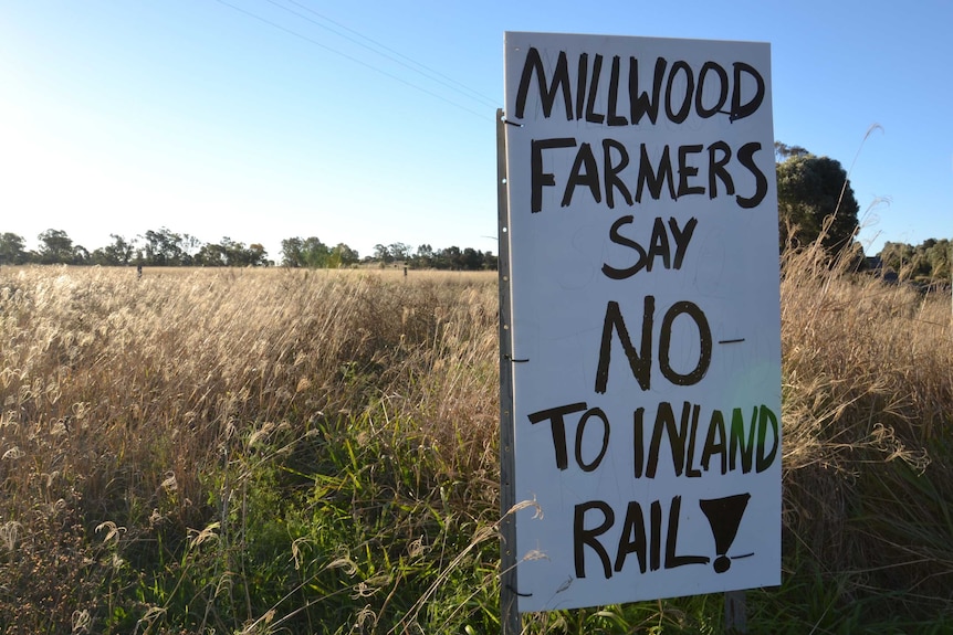A sign read: 'Millwood farmers say no to inland rail'