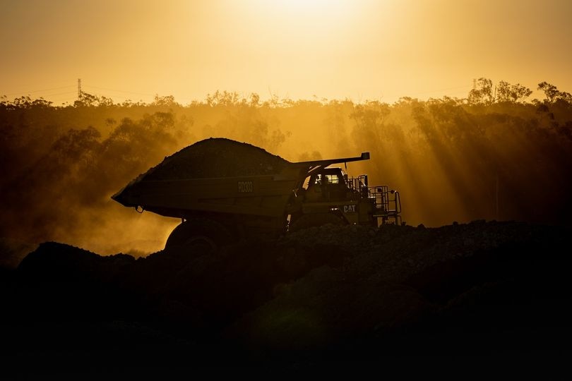 A mining truck at dusk