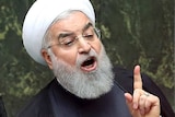 Iranian President Hassan Rouhani speaks in front of Iran's parliament