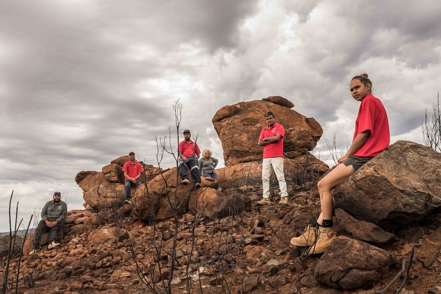 Aboriginal people on their traditional lands after a bushfire