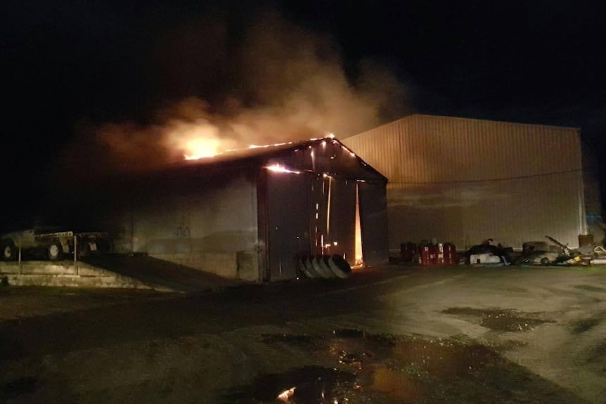Fire engulfs the Crossling Contractors shed.